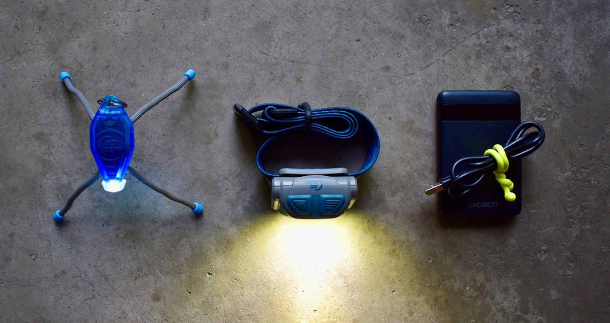  Radiant RH2 PowerSwitch Headlamp and Buglit on table