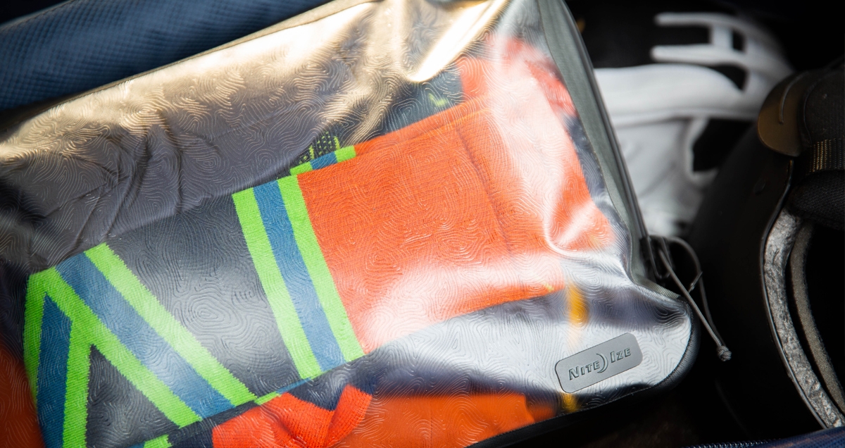 Clothing packed in a RunOff Waterproof Packing Cube