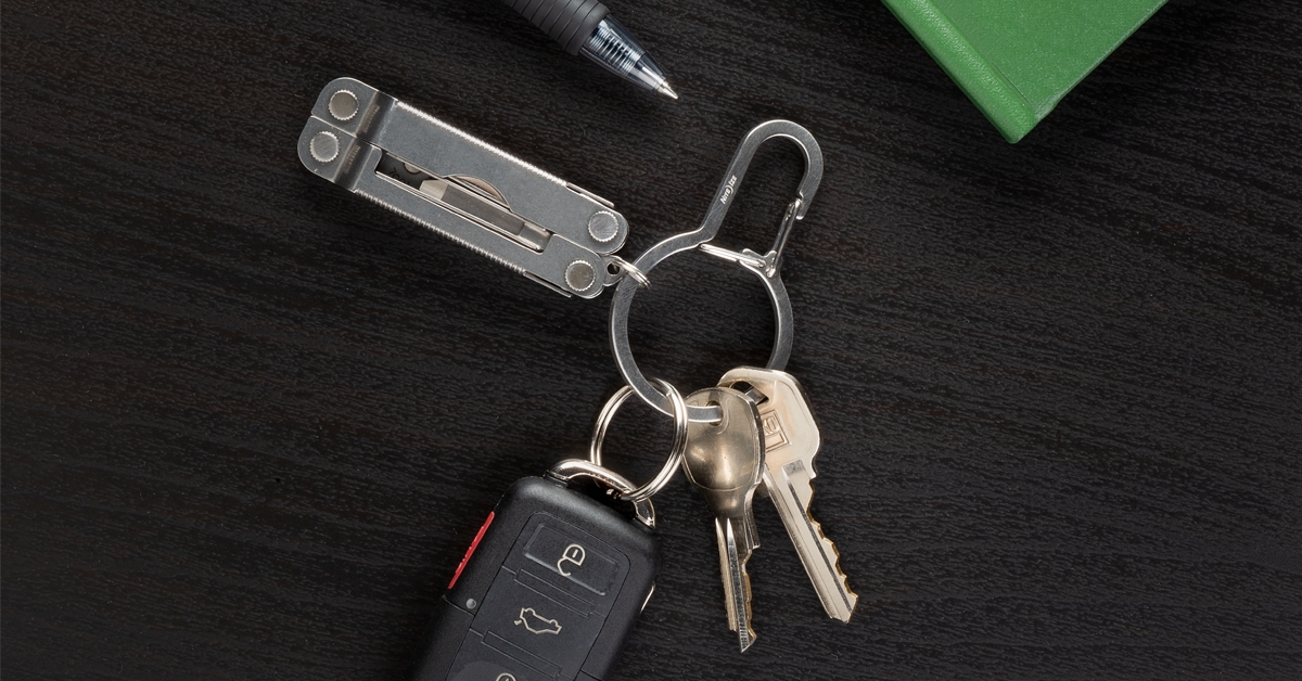 DualPass™ Dual Chamber Key Ring on table