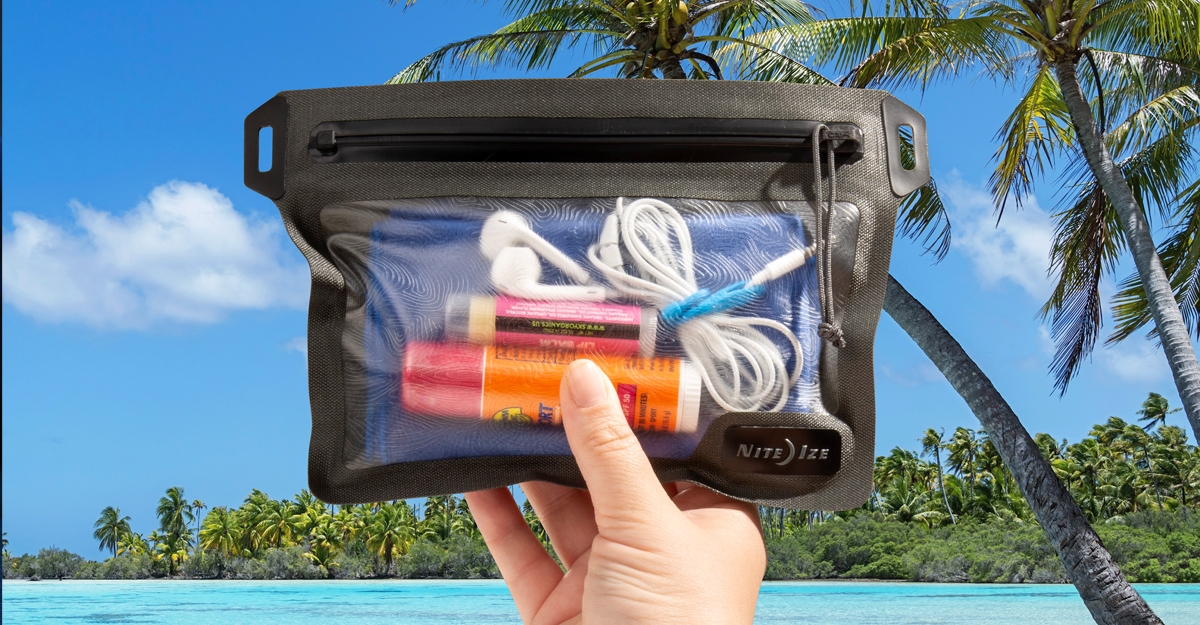 RunOff Waterproof Pouch on a beach 