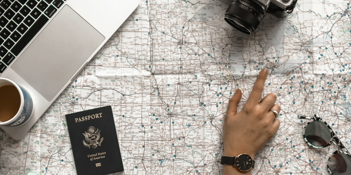 Person pointing at a point on a map