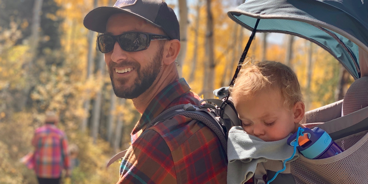 Dad hiking with child